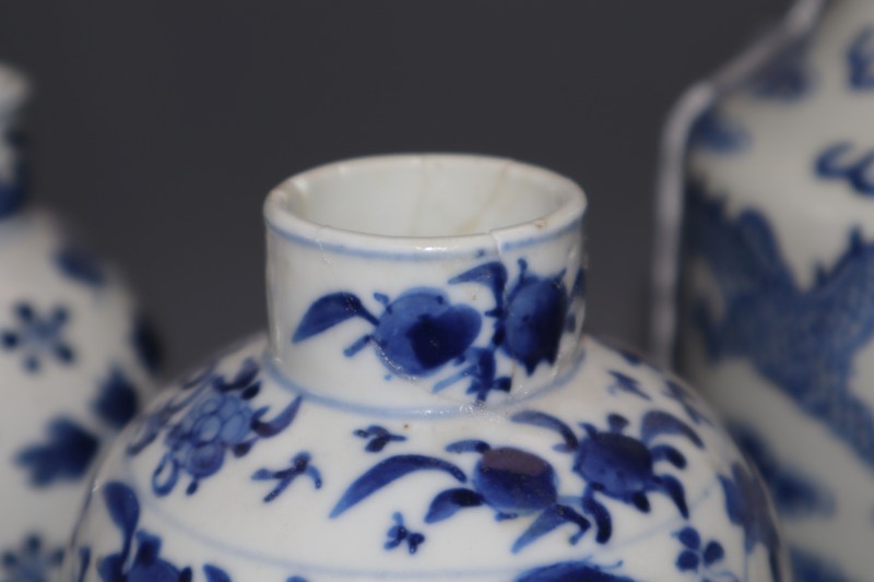 A Chinese blue and white dragon vase, two blue and white vases and a jar, all c.1880-1910, tallest 25.5cm